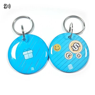 Llavero inteligente de epoxi RFID NFC programable NTAG213 de 13,56 MHz personalizado